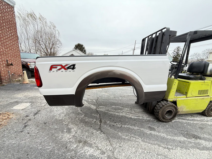 11-16 Superduty 6’9” short bed Pearl White/ Caribou #12706